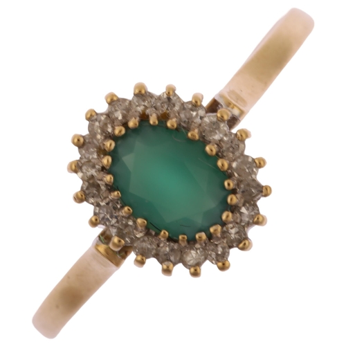 1224 - A modern 9ct gold emerald and diamond oval cluster ring, set with oval mixed-cut emerald and single-... 