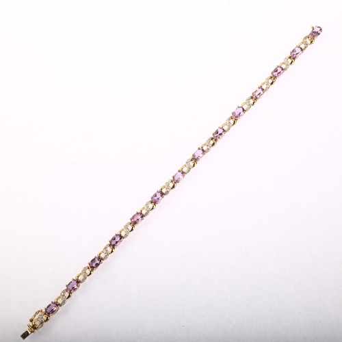 1226 - A modern 9ct gold amethyst and diamond tennis line bracelet, length 18cm, 8.2g