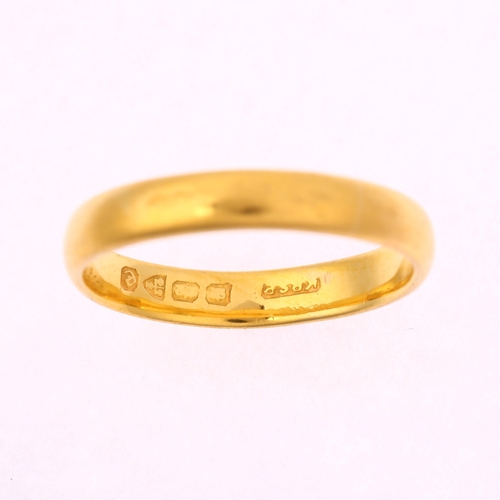 1227 - An early 20th century 22ct gold wedding band ring, hallmarks Chester 1930, band width 3.3mm, size M,... 