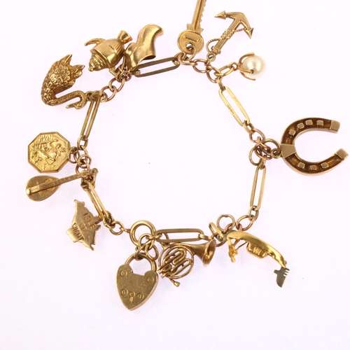 1169 - A 9ct gold charm bracelet, with various gold charms, bracelet length 19cm, 19.8g