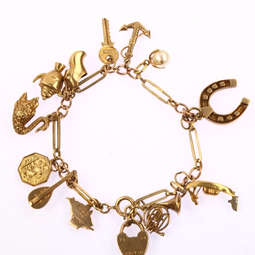 1169 - A 9ct gold charm bracelet, with various gold charms, bracelet length 19cm, 19.8g