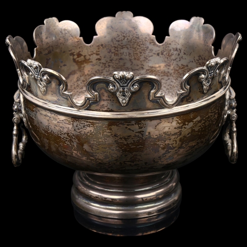 1500 - A George V silver monteith punch bowl, with moulded rim and lion mask handles, by Hawksworth, Eyre &... 