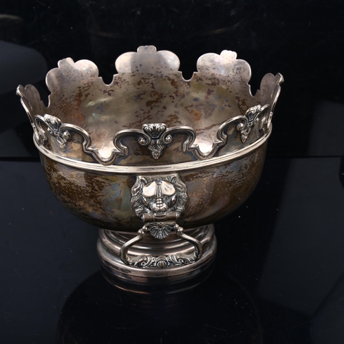 1500 - A George V silver monteith punch bowl, with moulded rim and lion mask handles, by Hawksworth, Eyre &... 