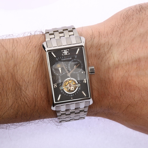 1018 - THOMAS EARNSHAW - a stainless steel automatic bracelet watch, ref. WB127672, black dial with sweep c... 