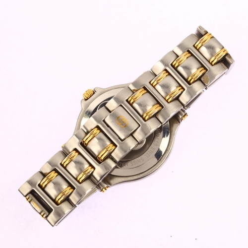 1024 - GUCCI - a gold plated stainless steel 9040M quartz bracelet watch, grey constellation dial with gilt... 
