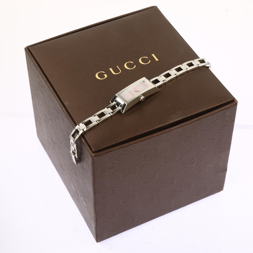 1035 - GUCCI - a lady's stainless steel 110G Link Series quartz bracelet watch, pink mother-of-pearl dial w... 