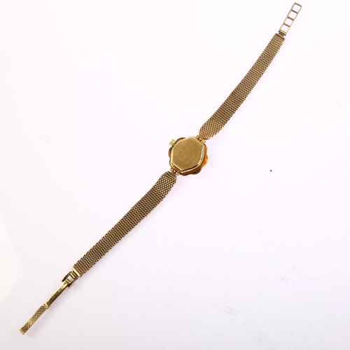1038 - ROTARY - a lady's Vintage 9ct gold mechanical wristwatch, silvered dial with gilt baton hour markers... 