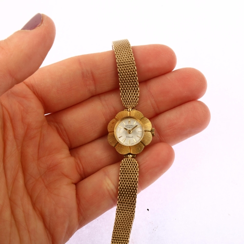 1038 - ROTARY - a lady's Vintage 9ct gold mechanical wristwatch, silvered dial with gilt baton hour markers... 