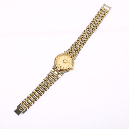 1042 - GUCCI - a lady's gold plated stainless steel 9000L quartz bracelet watch, cream dial with gilt baton... 