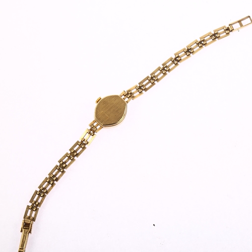 1044 - ACCURIST - a lady's 9ct gold quartz bracelet watch, champagne dial with gilt baton hour markers, cas... 
