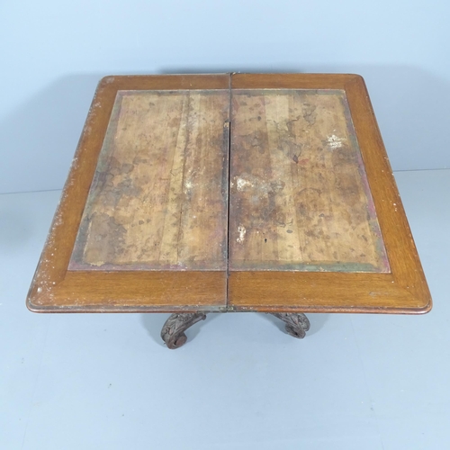 2051 - A 19th century carved oak fold-over card table, raised on central column with platform base. 89x78x4... 
