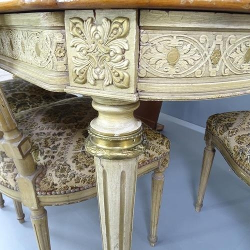 2280 - An ornate French walnut and kingwood dining table, with inlaid floral decoration on carved and paint... 