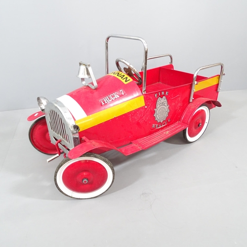 2066 - A vintage painted child's pedal fire engine. 116x66x50cm.