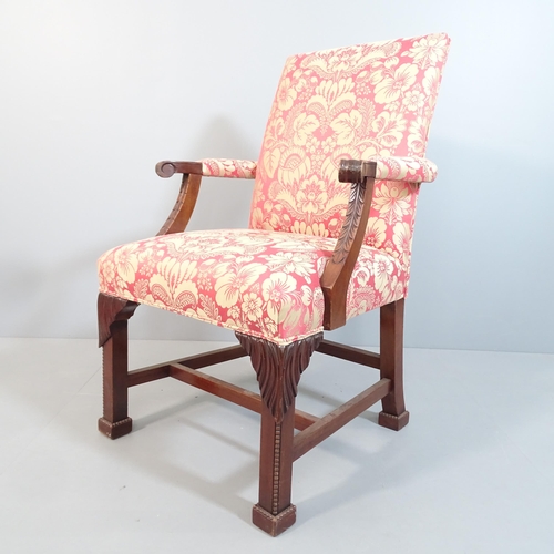 2068 - A mahogany and upholstered Gainsborough style open armchair, with carved decoration. Overall 65x102x... 