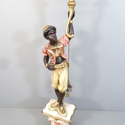 2077 - A 19th Century polychrome painted and parcel gilt Blackamoor style floor standing torchere. Height 2... 