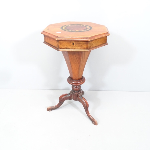 2085 - A Victorian mahogany trumpet sewing workbox on tripod base. 41x71cm.