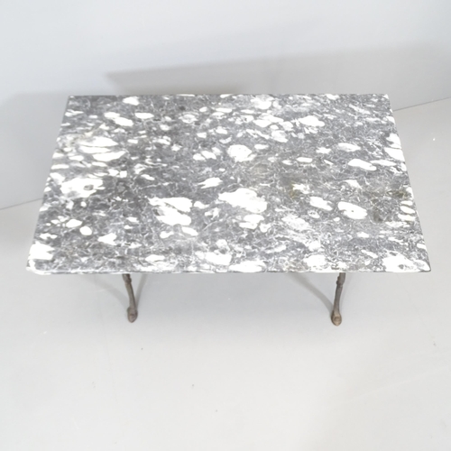 2088 - A veined black marble-topped garden table on cast iron stand. 100x70x60cm.