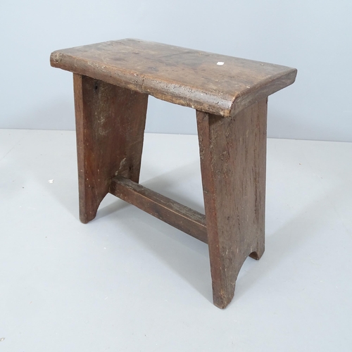 2090 - An 18th century oak stool. 50x50x28cm.