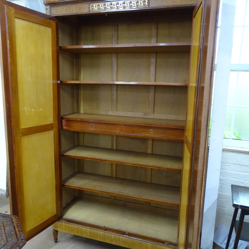 2092 - A French walnut armoire, with two mirrored doors and shelved interior. 132x235x48cm.