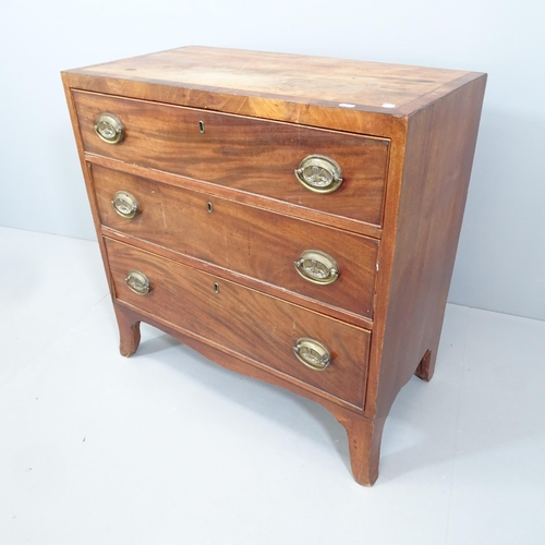 2093 - A small Georgian mahogany chest of three long drawers. 84x82x43cm