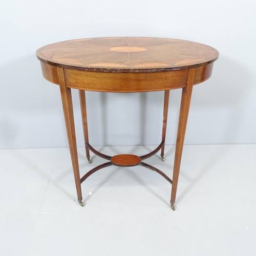 2098 - An Edwardian mahogany and satinwood strung oval occasional table, with scallop inlaid top and raised... 