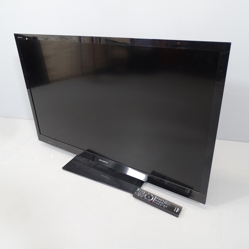 2102 - A Sony Bravia KDL-46EX723, 46 inch LCD TV, with remote control and