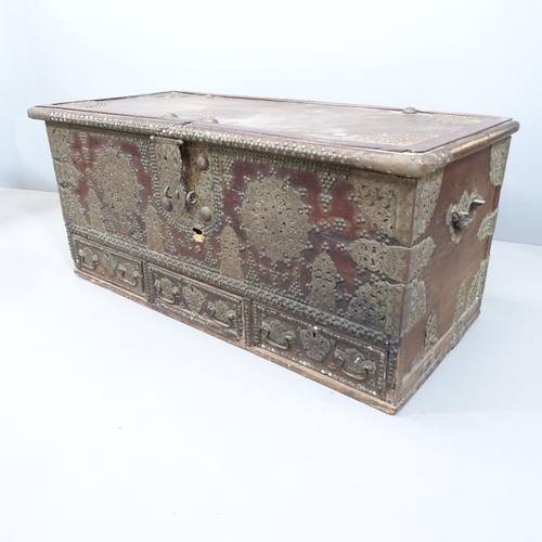 2103 - An African Omani brass-mounted teak Zanzibar chest, with 3 drawers and all over brass stud and plate... 