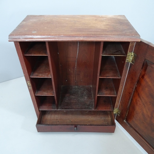 2111 - An Antique mahogany spice cupboard, the single door revealing a fitted interior. With key. 47x56x26c... 