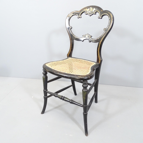 2112 - A Regency ebonised and gilded cane seated berger chair, with inlaid mother of pearl decoration.