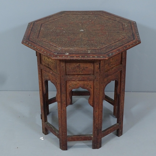 2114 - An Anglo-Indian octagonal occasional table on folding base, with inlaid brass leaf decoration. 46x46... 