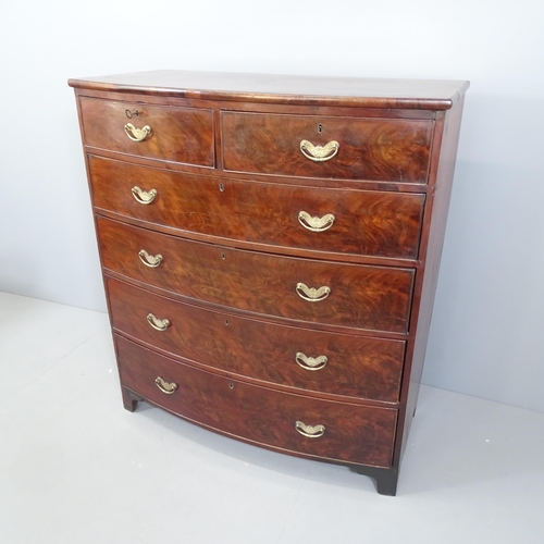 2115 - A Georgian flame mahogany veneered bow-front chest of two short and three long drawers. 107x119x53cm... 