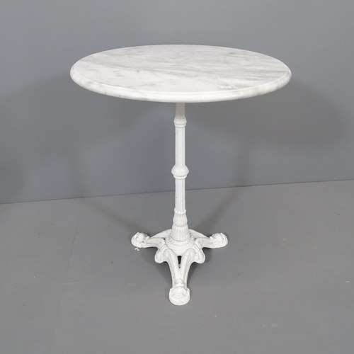 2117 - A circular marble top garden table on white painted cast iron base. 60x74cm