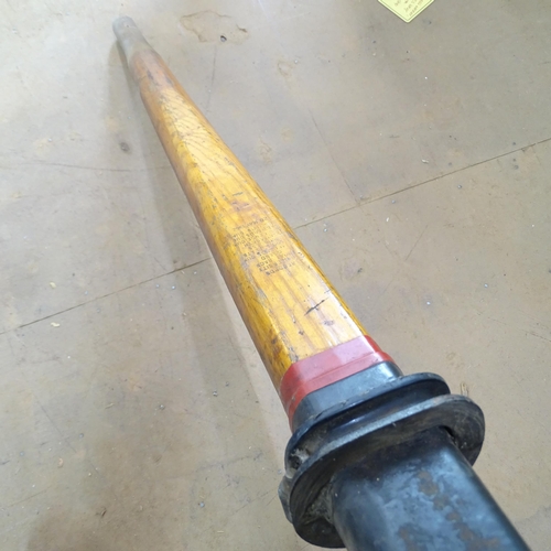 2121 - A vintage racing scull rowing oar with curved blade. Length 366cm.