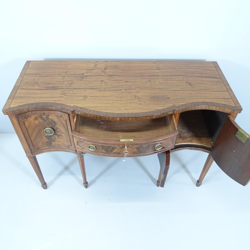 2128 - A 19th century mahogany and ebony strung sideboard of serpentine form. 139x92x60cm. With key.