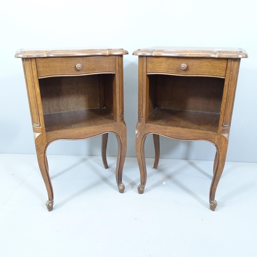 2133 - A pair of French oak bedside tables. 44x70x32cm.