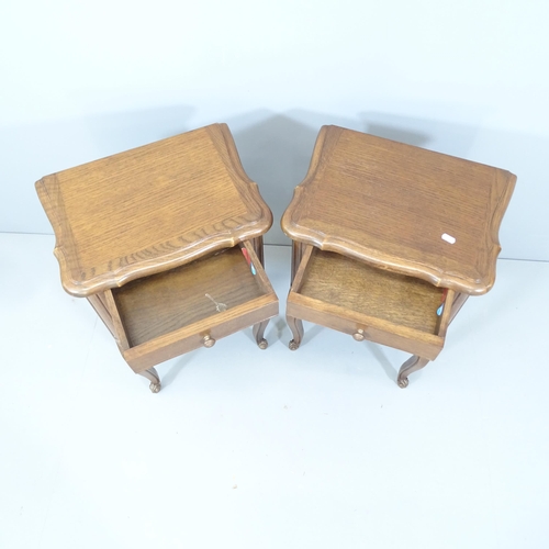 2133 - A pair of French oak bedside tables. 44x70x32cm.