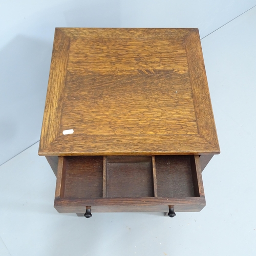 2135 - An antique oak sewing table with three fitted drawers. 43x69x43cm.