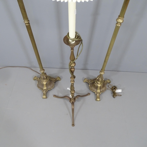 2139 - A pair of 1920s brass standard lamps, height to bayonet fitting 138cm, and another (3).