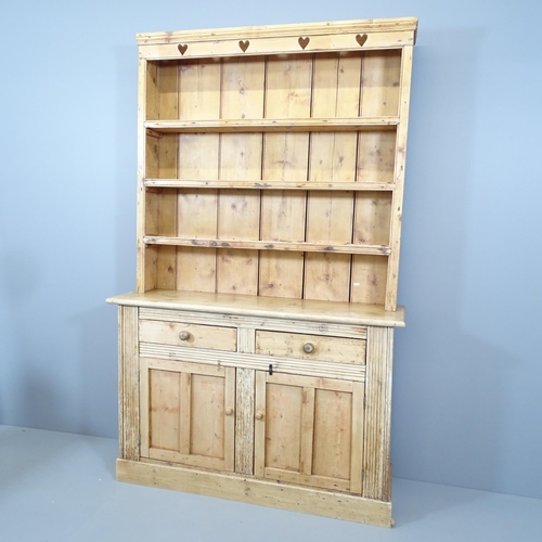 2140 - A Victorian pine two-section kitchen dresser, with open plate rack, two frieze drawers and cupboards... 