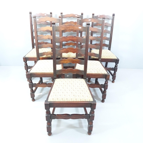 2142 - A set of six antique oak ladderback dining chairs with drop-in seats.