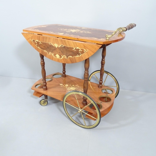 2015 - An Italianate mid-century design two-tier drinks trolley with marquetry decoration. 80x78x45cm