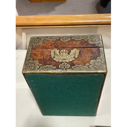 81 - 19th century French amboyna and brass-bound travelling case, armorial brass crest to the lid 