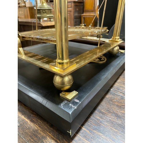 266 - A 20th century brass Congreve clock, with rolling ball fusee movement housed in glass display cabine... 