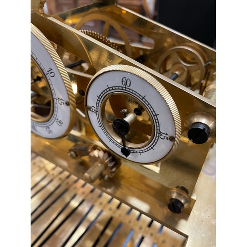 266 - A 20th century brass Congreve clock, with rolling ball fusee movement housed in glass display cabine... 