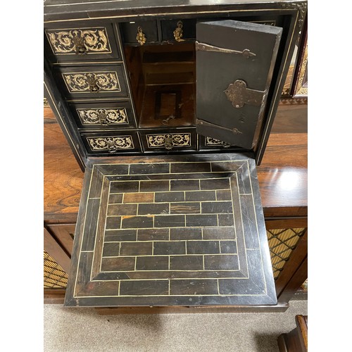 264 - An 18th century Italian ebonised table-top cabinet with ivory engraved panels of Classical form, wit... 