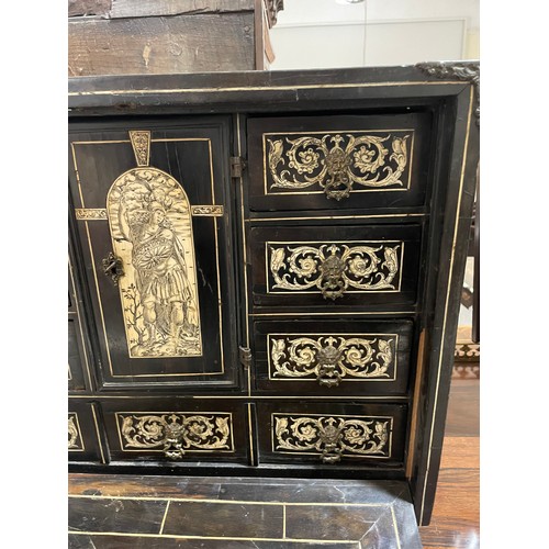 264 - An 18th century Italian ebonised table-top cabinet with ivory engraved panels of Classical form, wit... 