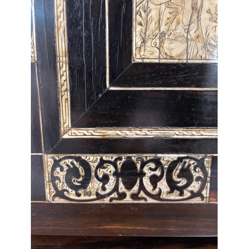 264 - An 18th century Italian ebonised table-top cabinet with ivory engraved panels of Classical form, wit... 