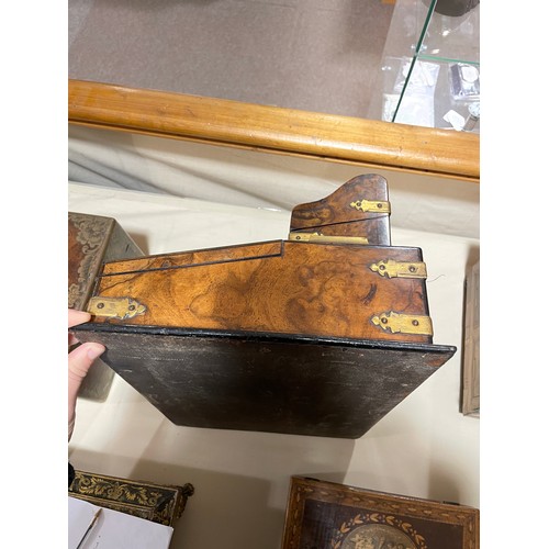 10 - A Victorian burr-walnut desk stand, with hinged stationery compartment above, and gilt-brass strapwo... 