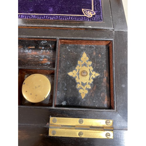 82 - A Victorian brass-bound coromandel writing slope, Gothic style engraved brass mounts and fitted inte... 