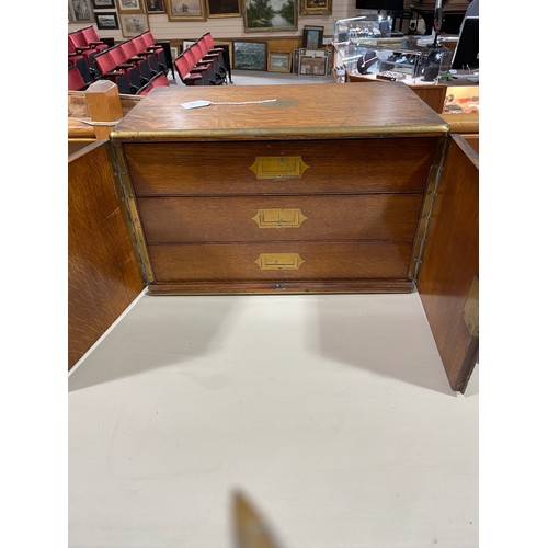 19 - A Victorian brass-bound oak cabinet, with 2 front doors enclosing 3 inner drawers, width 47cm, depth... 